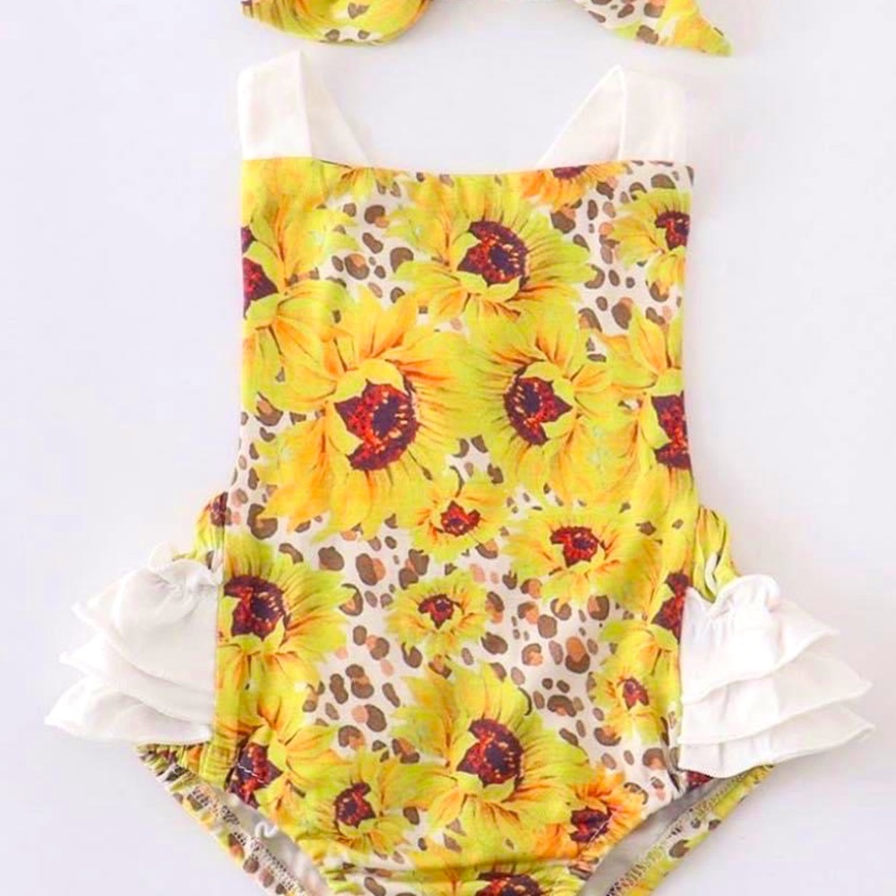 Brand new summer girl outfit size 24 months comes with matching headband.